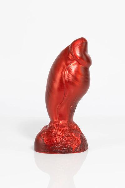 A product photo of a red minotaur dildo taken from the side.