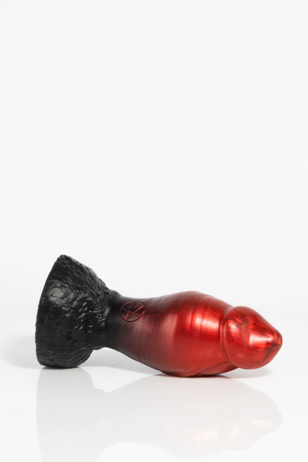 A product photo of a minotaur dildo lying down.