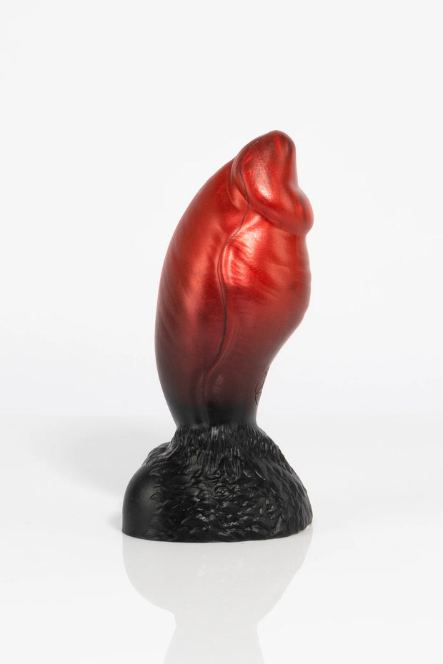A product photo of a minotaur dildo taken from the side.