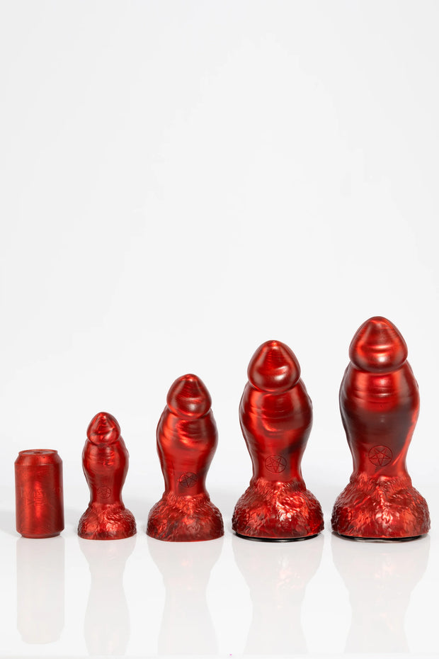 A size comparison photo of Aamon, a minotaur dildo by Twisted Beast