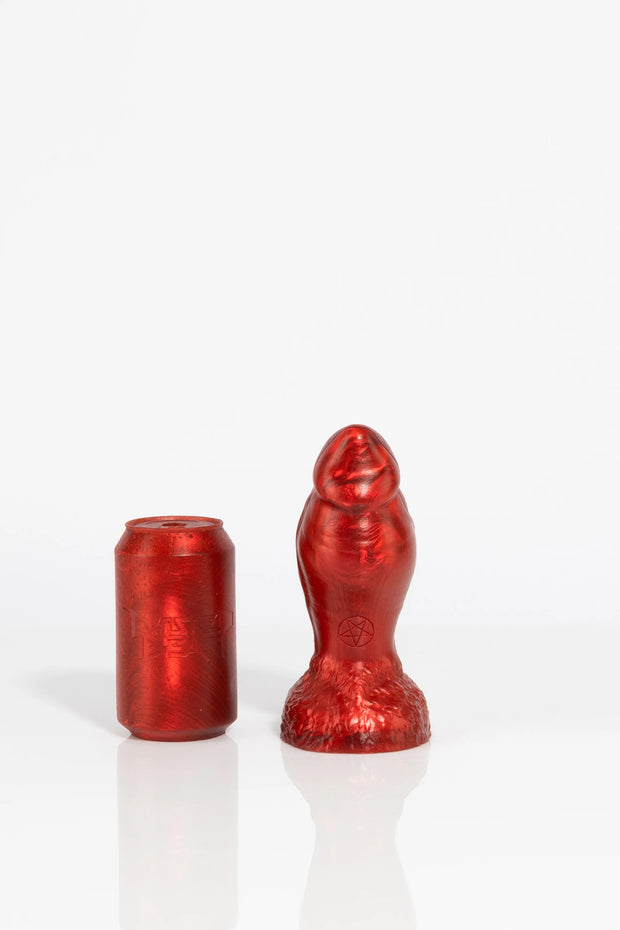 A product photo of a small red minotaur dildo.