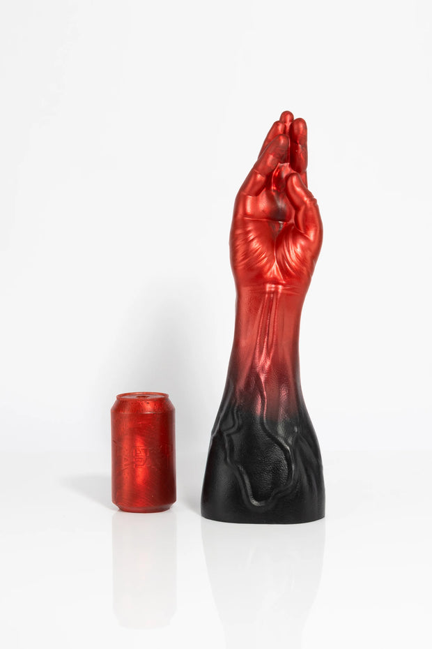 A product photo of a large ombre coloured fist dildo.