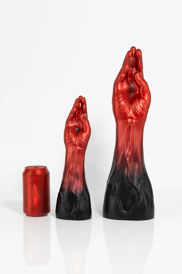 A size comparison photo of a ombre-coloured fist dildo.