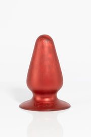 A red anal butt plug.