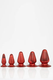 A size comparison photo of red anal butt plugs.
