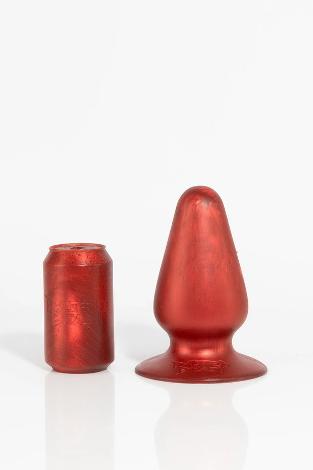 A large red anal butt plug.